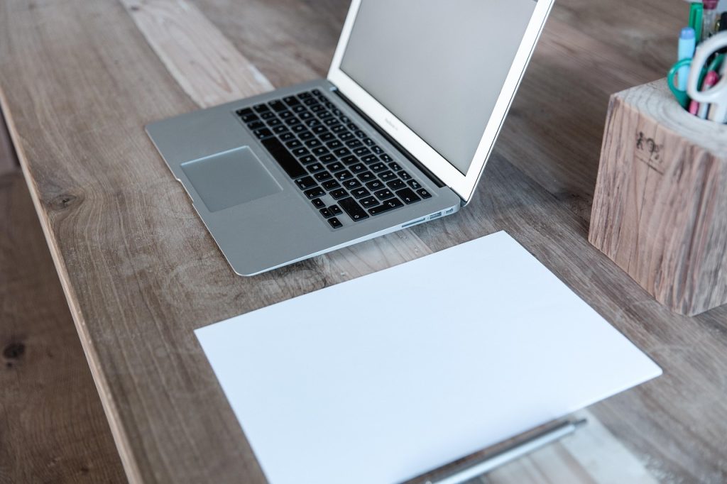 Home office, laptop, notebook — Coronation Property: A Data-Driven Overview of Market Presence, Development Portfolio, and Ur
