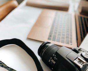 Laptop, camera, desk — Windows Server 2025: Key Insights and Trends